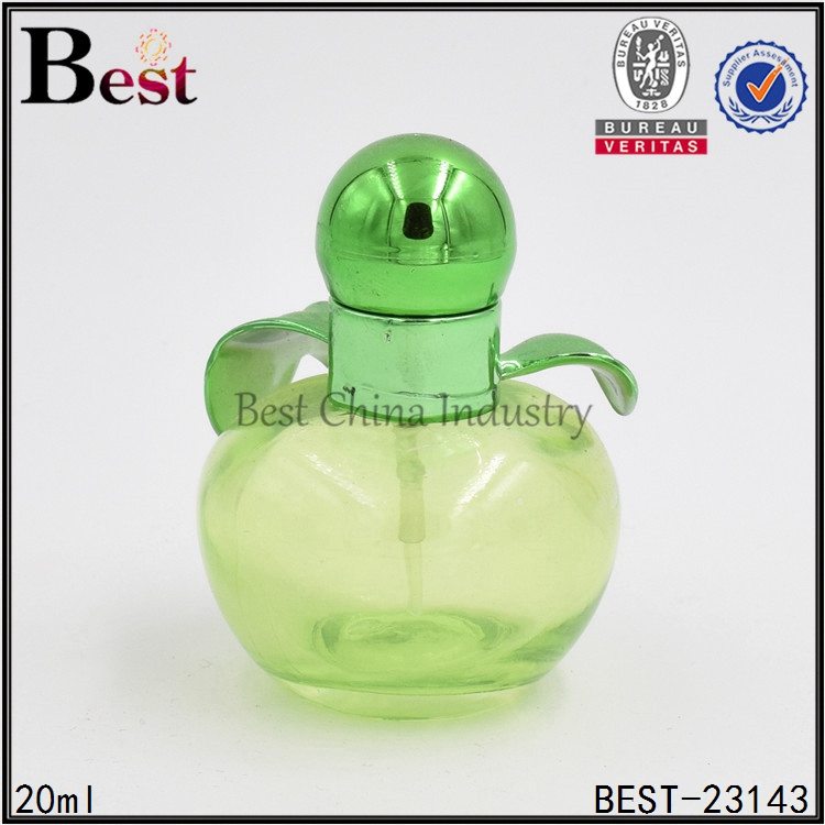 green pink apple shaped glass perfume 